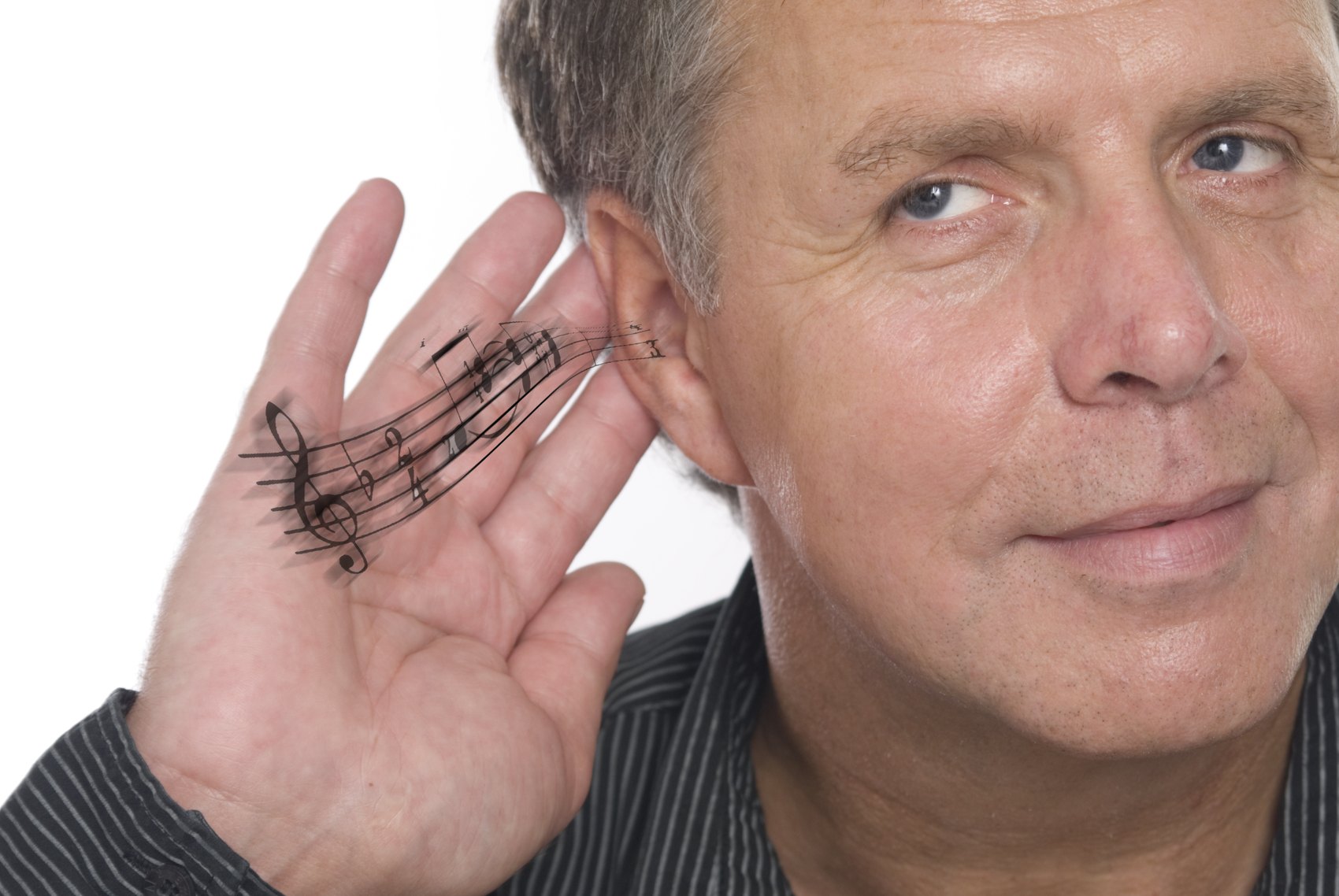 Jürgen Schlüter, der Klangmeister – die Hand lauschend am Ohr, Musik aus seiner Handfläche